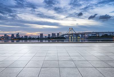 cityscape and skyline of tokyo at sunset from empty floor