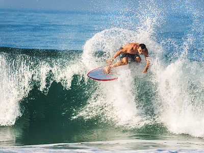 Riding a wave.