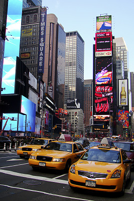 Three Yellow taxi Times Square