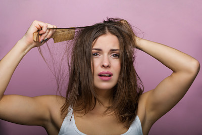 Woman brushing her hair
