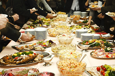 Catering table full of tasty food