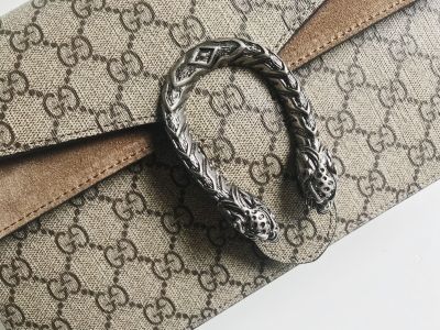 服饰系列实景Gucci酒神单肩包细节场景图