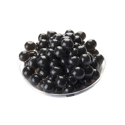 Black bubble tea tapioca pearls in plastic container