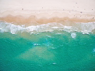 An aerial view of the beach in summer