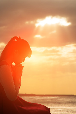 woman pray pious