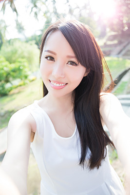 young woman smile to you