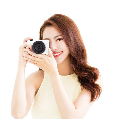 happy young  woman with camera
