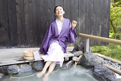 Women dipped foot baths