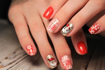 Abstract New Year design on women's nails.