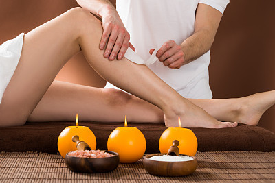 Woman Getting Her Leg Waxed