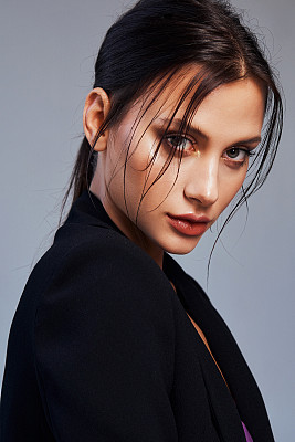 Magnificent hair. Smoky eyes. Vogue style. Beauty model with long black flying hair.