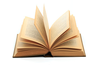 open vintage book isolated on a white background -Image