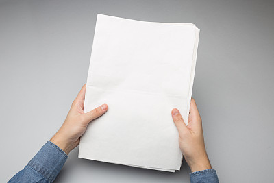 Blank Newspapper Mock-up in hands