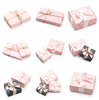 Set of pink gift boxes on white background.