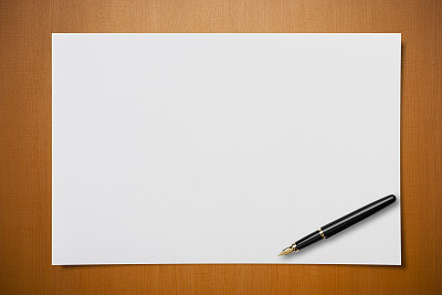 Blank paper on Desk with a pen