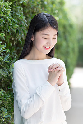 outdoors portrait of beautiful young brunette girl.