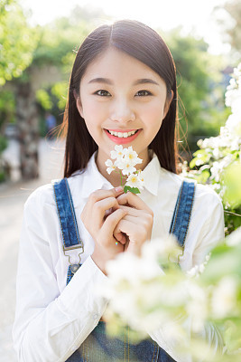 outdoors portrait of beautiful young brunette girl.