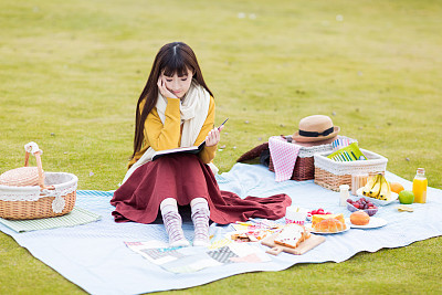 girl sitting on the lawn