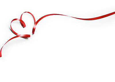 Red Silk Ribbon In Heart Shape On White Background