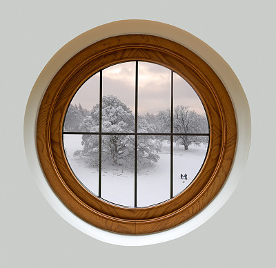 porthole window with winter view