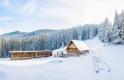beautiful wooden house in a winter sunny day.