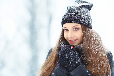 Winter young woman portrait. Beauty Joyful Model Girl laughing and