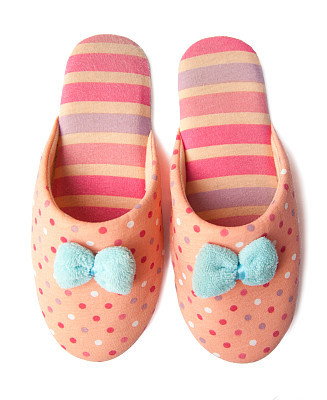 Cute funny pink striped dotted girl clown slippers isolated