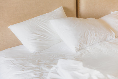 Messy pillow in bed
