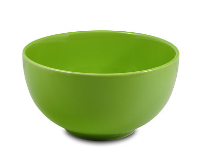Green ceramic bowl on a white background