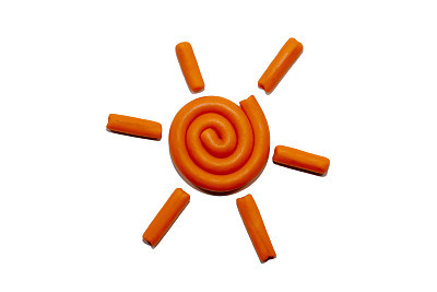 Plasticine sun isolated on a white background