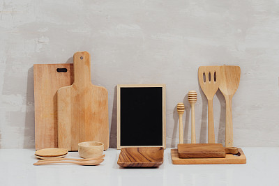 Kitchen utensils background with a blank space for a text, home kitchen decor concept, front view