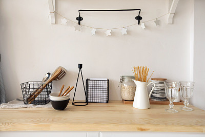 Furniture and dishware in kitchen