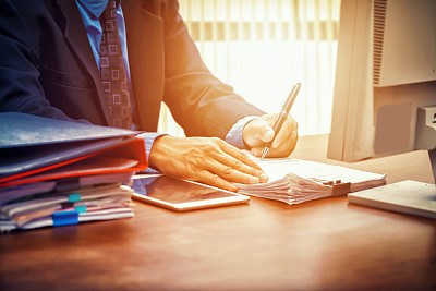 business man signing contract making a deal