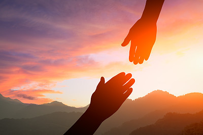 helping hand with the sky sunset