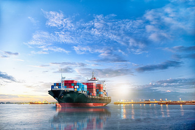 Logistics and transportation of International Container Cargo ship in the ocean at twilight sky, Freight Transportation, Shipping