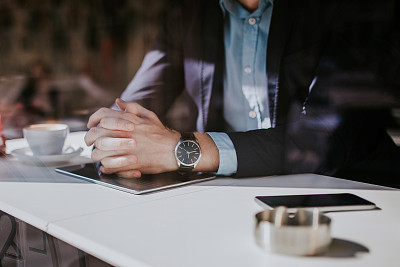 Well Dressed Man in Coffee Shop