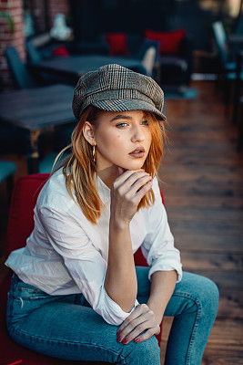 Young Woman in Cafe