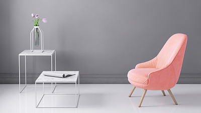 Pastel colored armchair with coffee table, flowers and blank wall template