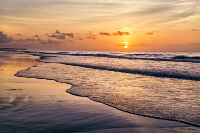 Dramatic beach sunrise or sunset