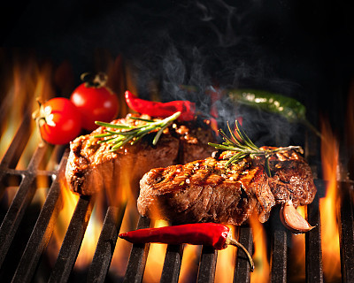 Beef steaks on the grill