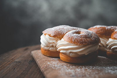 Baked traditional Swedish Lusse-semla dessert