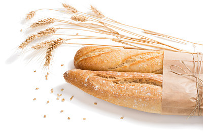 Loaves of french baguette bread tied together with paper