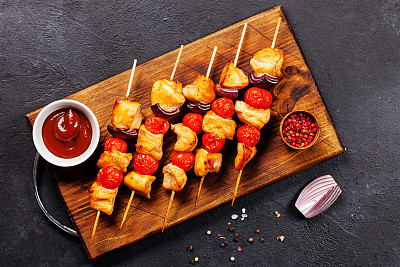 Chicken kebab or shashlik with vegetables