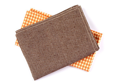 crumpled orange brown checkered napkin table clothes  on white background.