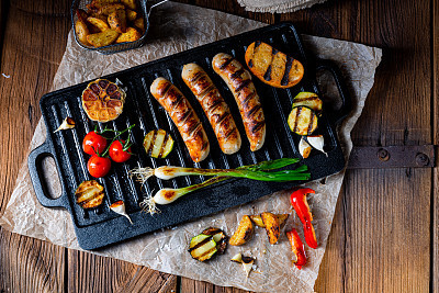 Delicious  grilled sausage with various grilled vegetables