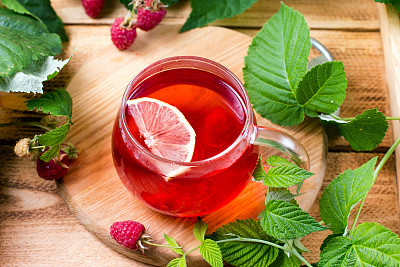 Red fruit tea with lemon and raspberry