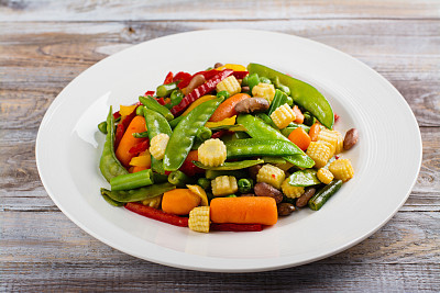 Stir fry vegetables on white plate