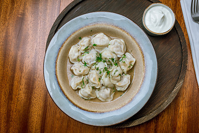 Dumplings with sour cream and herbs