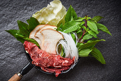 Sukiyaki set Shabu shabu with meat beef slice noodle mushroom and fresh vegetables on pot Japanese foods Asian
