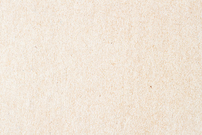 Texture of old organic light cream paper. Recyclable material with small inclusions of cellulose. Background , backdrop, substrate, composition use for design
